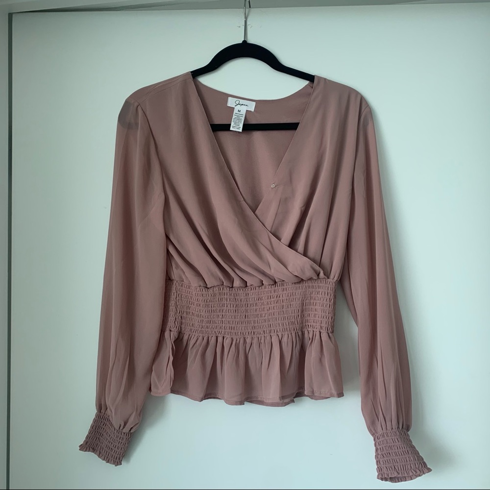 Light pink blouse. Size M. Never worn.